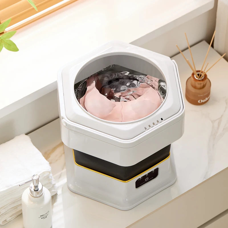 Compact, powerful, foldable, and ready-for-anything mini washing machine, 2-in-1 portable washing machine.